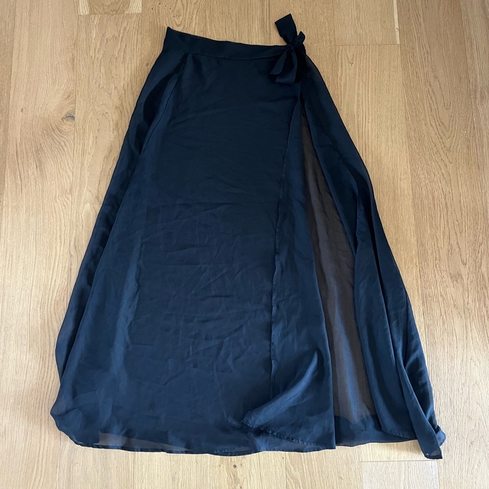 Women’s size M maxi beach cover up black sheer skirt with waist tie slit detail.